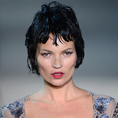Kate drew applause while walking in Louis Vuitton's Fall 2013 show in Paris sporting a cropped black wig and crimson lips.
Kate drew applause while walking in Louis Vuitton's Fall 2013 show in Paris sporting a cropped black wig and crimson lips.