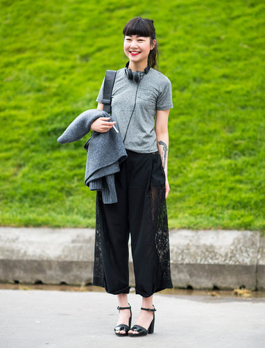 Cropped wide trousers provided plenty of volume; tamper it with a slim tee like this stylish Parisienne.
Cropped wide trousers provided plenty of volume; tamper it with a slim tee like this stylish Parisienne.