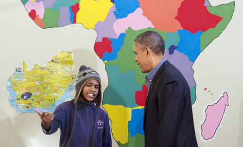 In June, President Obama watched as a young boy rapped for him during a tour of the Desmond Tutu HIV Foundation Youth Center in Cape Town, South Africa.
In June, President Obama watched as a young boy rapped for him during a tour of the Desmond Tutu HIV Foundation Youth Center in Cape Town, South Africa.