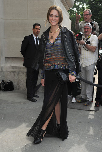 A high slit provided some breeze for this showgoer, who topped off her skirt with a patterned sweater and moto jacket.
A high slit provided some breeze for this showgoer, who topped off her skirt with a patterned sweater and moto jacket.