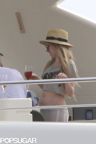 Avril Lavigne sipped a cocktail.
Avril Lavigne sipped a cocktail.