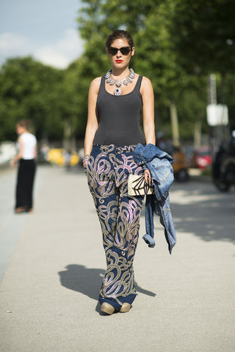 Steal a page from this showgoer's styling manual and add interest to a basic tank with statement pants and heavy jewels.
Source: Le 21ème | Adam Katz Sinding
Steal a page from this showgoer's styling manual and add interest to a basic tank with statement pants and heavy jewels.
Source: Le 21ème | Adam Katz Sinding