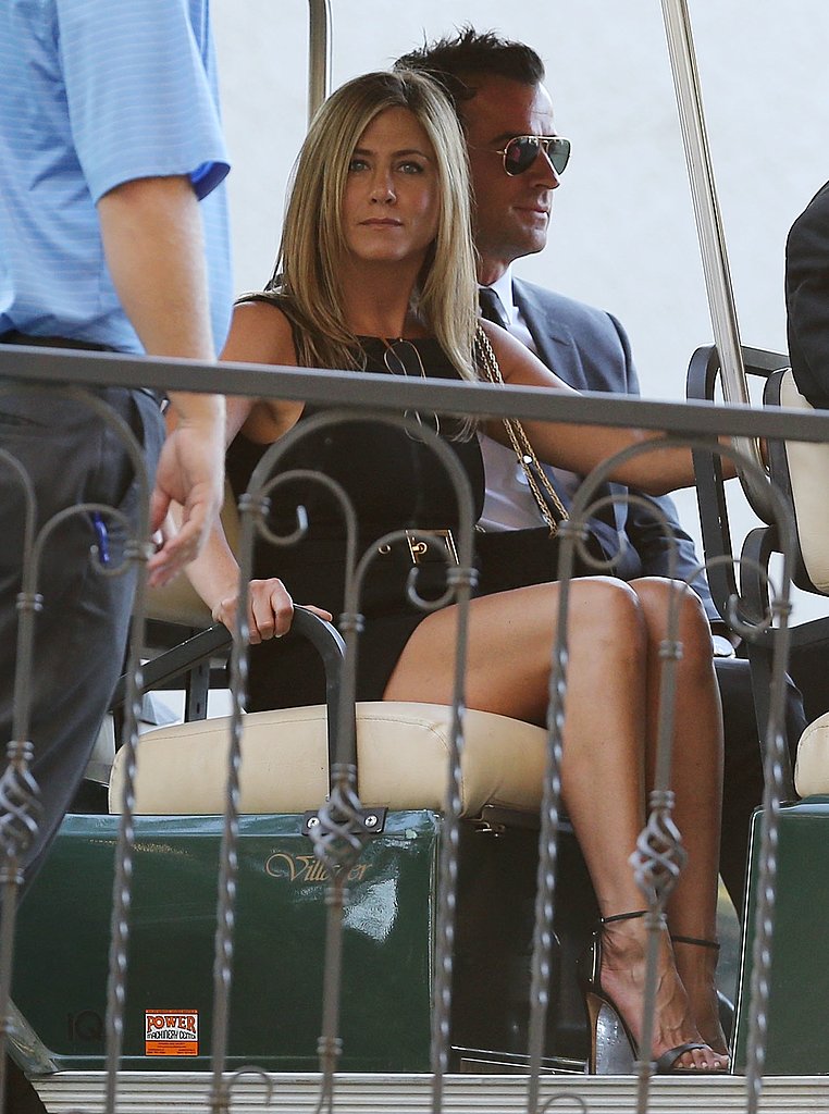 At Jimmy Kimmel's wedding in July, Jennifer Aniston looked sleek and chic in all black. She finished with sexy, black ankle-strap sandals and a chain-handle purse. Follow her lead by going head-to-toe black at your next nuptials.
At Jimmy Kimmel's wedding in July, Jennifer Aniston looked sleek and chic in all black. She finished with sexy, black ankle-strap sandals and a chain-handle purse. Follow her lead by going head-to-toe black at your next nuptials.