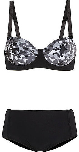 Camo at the beach? This Beth Richards Brigitte camo-print underwired bikini ($260) makes it possible with a cool-girl upgrade on a classic silhouette.
Camo at the beach? This Beth Richards Brigitte camo-print underwired bikini ($260) makes it possible with a cool-girl upgrade on a classic silhouette.