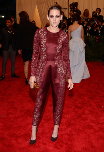 As modern-day punk royalty, we counted on Stewart to bring her edgy A-game to this year's Met Gala — and the actress didn't disappoint. The brunette beauty stunned in an oxblood lace-inset jumpsuit — complete with coordinating eye shadow and nail polish — studded pumps, and a mirrored box clutch, all by Stella McCartney.
As modern-day punk royalty, we counted on Stewart to bring her edgy A-game to this year's Met Gala — and the actress didn't disappoint. The brunette beauty stunned in an oxblood lace-inset jumpsuit — complete with coordinating eye shadow and nail polish — studded pumps, and a mirrored box clutch, all by Stella McCartney.