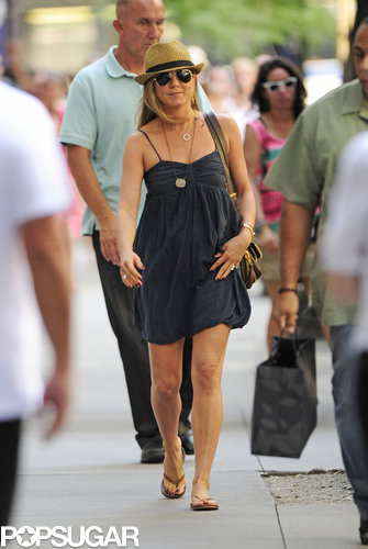 Jennifer Aniston smiled while walking to her set on July 16.
Jennifer Aniston smiled while walking to her set on July 16.