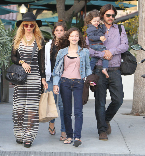 During a family outing, Rachel Zoe stood out in a sheer striped maxi dress. A black cardigan, black hat, quilted Chanel bag, and wedge sandals completed her SoCal style.
During a family outing, Rachel Zoe stood out in a sheer striped maxi dress. A black cardigan, black hat, quilted Chanel bag, and wedge sandals completed her SoCal style.