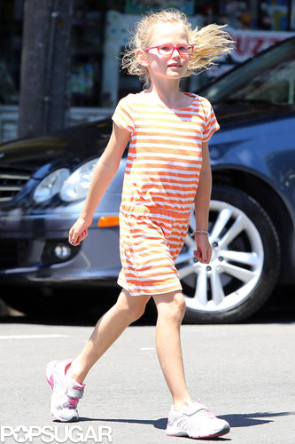 Violet Affleck trotted across the street.
Violet Affleck trotted across the street.