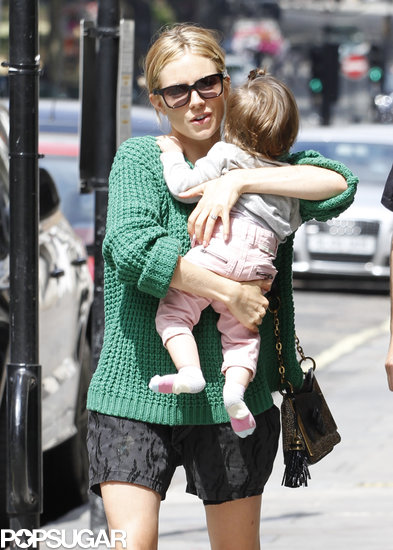 Sienna Miller held on to her daughter, Marlowe Sturridge.
Sienna Miller held on to her daughter, Marlowe Sturridge.