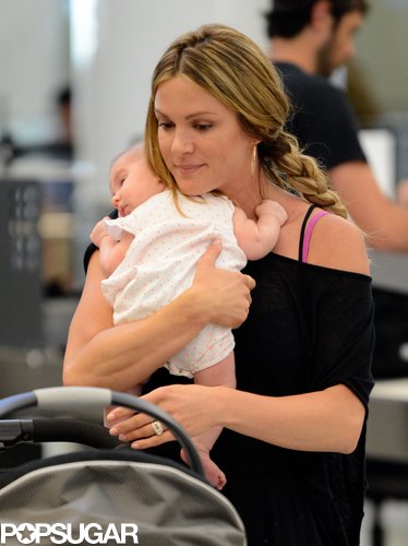 Danneel Harris held her daughter, Justice Jay Ackles, while at LAX on Wednesday.
Danneel Harris held her daughter, Justice Jay Ackles, while at LAX on Wednesday.
