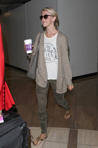 Julianne Hough stayed in neutral territories in camouflage jeans, a white tee, and beige cardigan at the airport.
Julianne Hough stayed in neutral territories in camouflage jeans, a white tee, and beige cardigan at the airport.