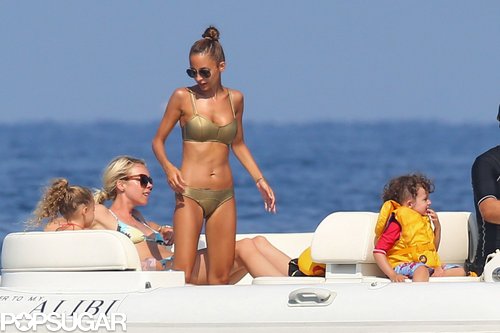 In July, Nicole Richie wore a gold bikini during an outing on the Mediterranean Sea.
In July, Nicole Richie wore a gold bikini during an outing on the Mediterranean Sea.