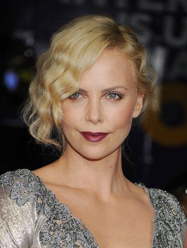 Charlize nailed another lipstick look with a glossy wine hue at a screening for The Road in 2009. She paired her vixen lips with peachy cheeks and a twisted updo for an extra shot of glamour.
Charlize nailed another lipstick look with a glossy wine hue at a screening for The Road in 2009. She paired her vixen lips with peachy cheeks and a twisted updo for an extra shot of glamour.