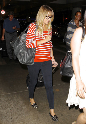 Lauren Conrad was comfortable but cute in a striped sweater, smoking slippers, and thick-rimmed glasses. Don't forget the oversize Balenciaga bag, either!
Lauren Conrad was comfortable but cute in a striped sweater, smoking slippers, and thick-rimmed glasses. Don't forget the oversize Balenciaga bag, either!