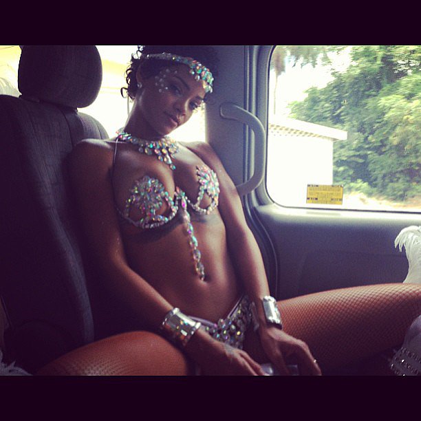 Rihanna flaunted her fit figure in a bejeweled costume while on her way to the Kadooment Day Parade.
Source: Instagram user badgalriri
Rihanna flaunted her fit figure in a bejeweled costume while on her way to the Kadooment Day Parade.
Source: Instagram user badgalriri