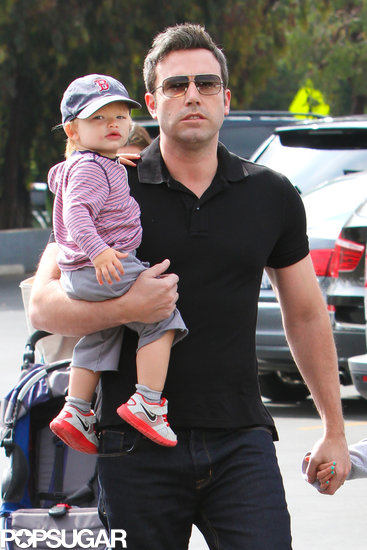 Ben Affleck held Samuel, who wore a Boston Red Sox baseball hat, during the family's trip to the farmers market.
Ben Affleck held Samuel, who wore a Boston Red Sox baseball hat, during the family's trip to the farmers market.