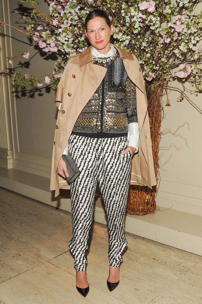 Bold prints and shine are topped off by a classic trench coat.
Bold prints and shine are topped off by a classic trench coat.