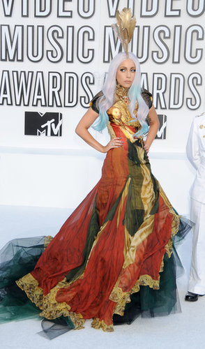 Lady Gaga honored the memory of her friend Alexander McQueen at the 2010 VMAs by arriving to the award show in a gown from the last collection he designed.
Lady Gaga honored the memory of her friend Alexander McQueen at the 2010 VMAs by arriving to the award show in a gown from the last collection he designed.