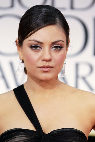 Pulling her hair back into a tight bun, Mila kept her makeup look monochromatic at the 2012 Golden Globes. She stuck to ballerina pink for her eyes, lips, and cheeks — and a sexy swipe of winged liner.
Pulling her hair back into a tight bun, Mila kept her makeup look monochromatic at the 2012 Golden Globes. She stuck to ballerina pink for her eyes, lips, and cheeks — and a sexy swipe of winged liner.