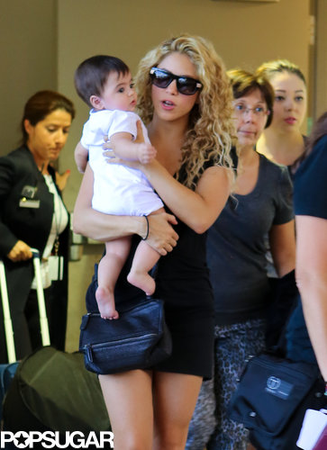 Shakira held on to her little one, Milan, while walking through the airport.
Shakira held on to her little one, Milan, while walking through the airport.