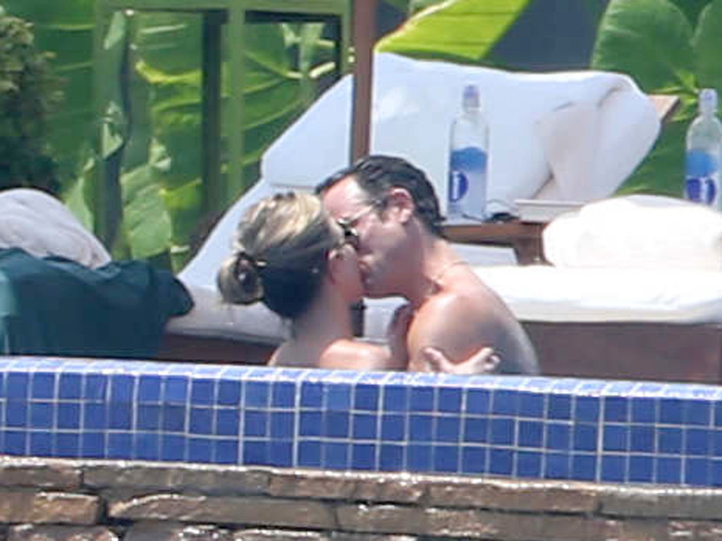 Jennifer Aniston gave fiancé Justin Theroux a steamy kiss in the jacuzzi during their Mexican getaway in August 2013.
Jennifer Aniston gave fiancé Justin Theroux a steamy kiss in the jacuzzi during their Mexican getaway in August 2013.