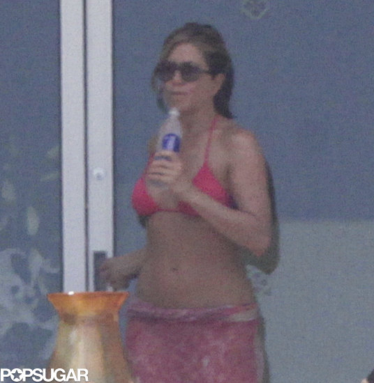 Jennifer Aniston walked around her patio.
Jennifer Aniston walked around her patio.