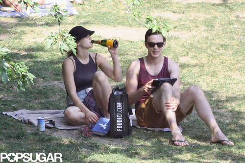 Jennifer Lawrence took a swig of Champagne while at the park.
Jennifer Lawrence took a swig of Champagne while at the park.