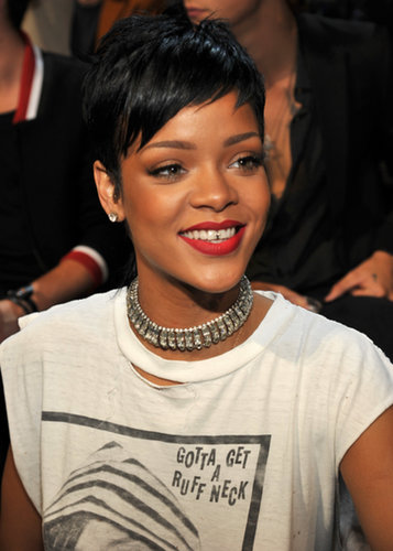 Rihanna paired her tiny grills with red lipstick and a mullet hairstyle.
Rihanna paired her tiny grills with red lipstick and a mullet hairstyle.