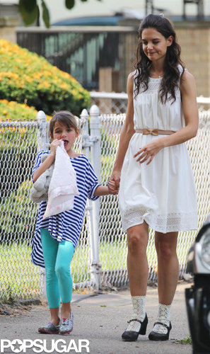 Katie Holmes held hands with Suri Cruise on set.
Katie Holmes held hands with Suri Cruise on set.