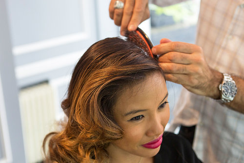 Brush and smooth the hair around the part for a sleek look.
Brush and smooth the hair around the part for a sleek look.