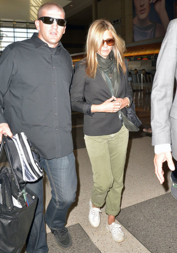 Jennifer Aniston looked cool in cargos and white sneakers as she departed LAX.
Jennifer Aniston looked cool in cargos and white sneakers as she departed LAX.