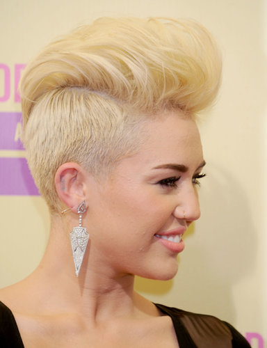 Jennifer Aniston's go-to hairstylist, Chris McMillan, was responsible for Miley's drastic hair change in Fall 2012. She went from a blossoming brunette to a provocative platinum blonde overnight.
Jennifer Aniston's go-to hairstylist, Chris McMillan, was responsible for Miley's drastic hair change in Fall 2012. She went from a blossoming brunette to a provocative platinum blonde overnight.
