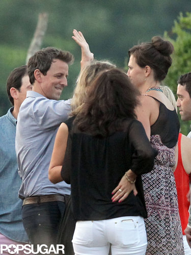 Seth Meyers gave Kristen Wiig a high five at his wedding festivities.
Seth Meyers gave Kristen Wiig a high five at his wedding festivities.