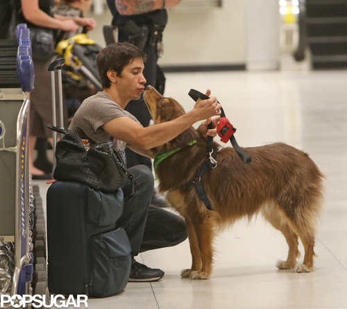 Justin Long gave Amanda Seyfried's dog, Finn, a kiss at the airport in NYC.
Justin Long gave Amanda Seyfried's dog, Finn, a kiss at the airport in NYC.