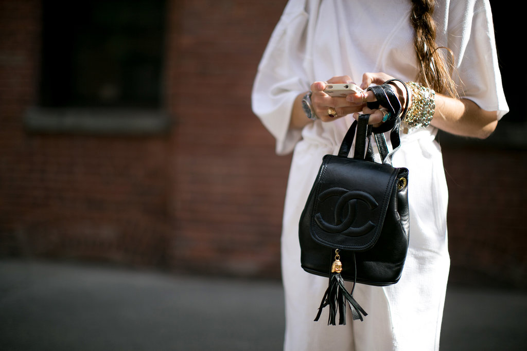 When you're toting a tassled Chanel backpack, you can keep the rest simple.
When you're toting a tassled Chanel backpack, you can keep the rest simple.
