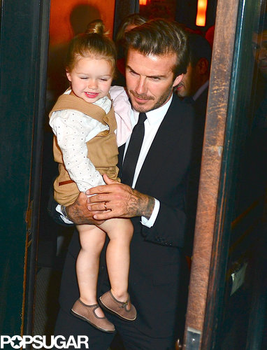 David Beckham carried baby Harper out of Balthazar Restaurant in NYC.
David Beckham carried baby Harper out of Balthazar Restaurant in NYC.