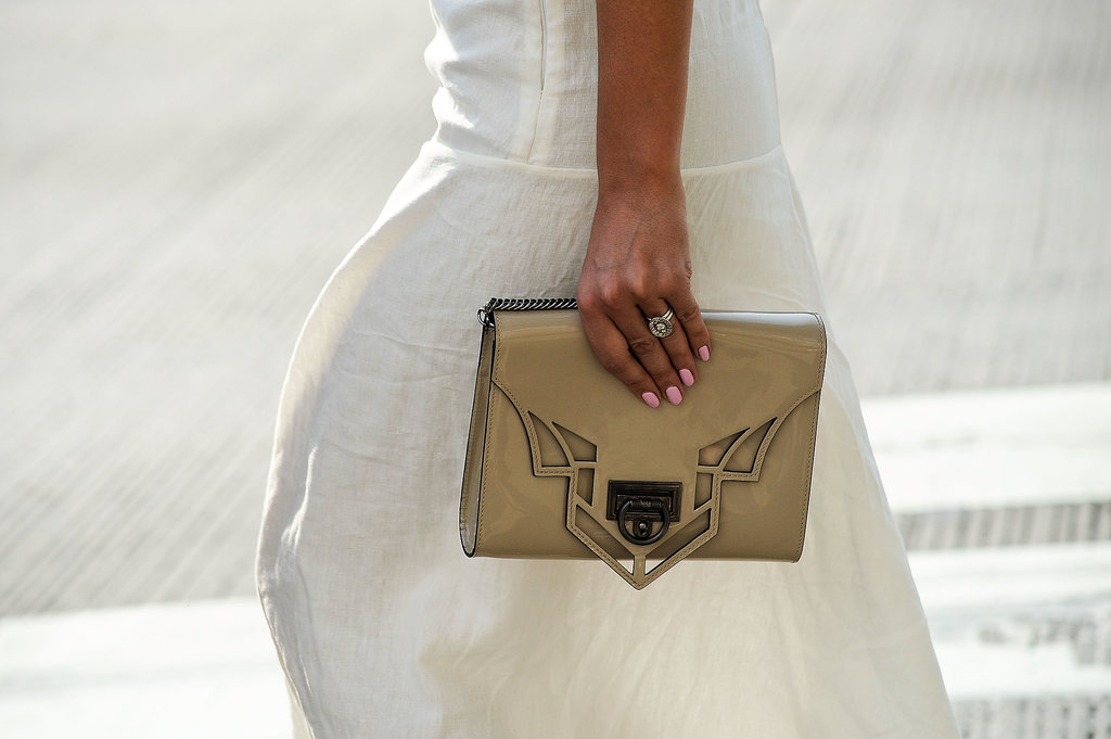 An understated clutch paired perfectly with a simple white dress.
An understated clutch paired perfectly with a simple white dress.