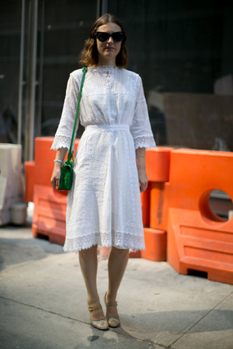 A bright green bag was a welcome pop of color against a pretty white dress.
A bright green bag was a welcome pop of color against a pretty white dress.