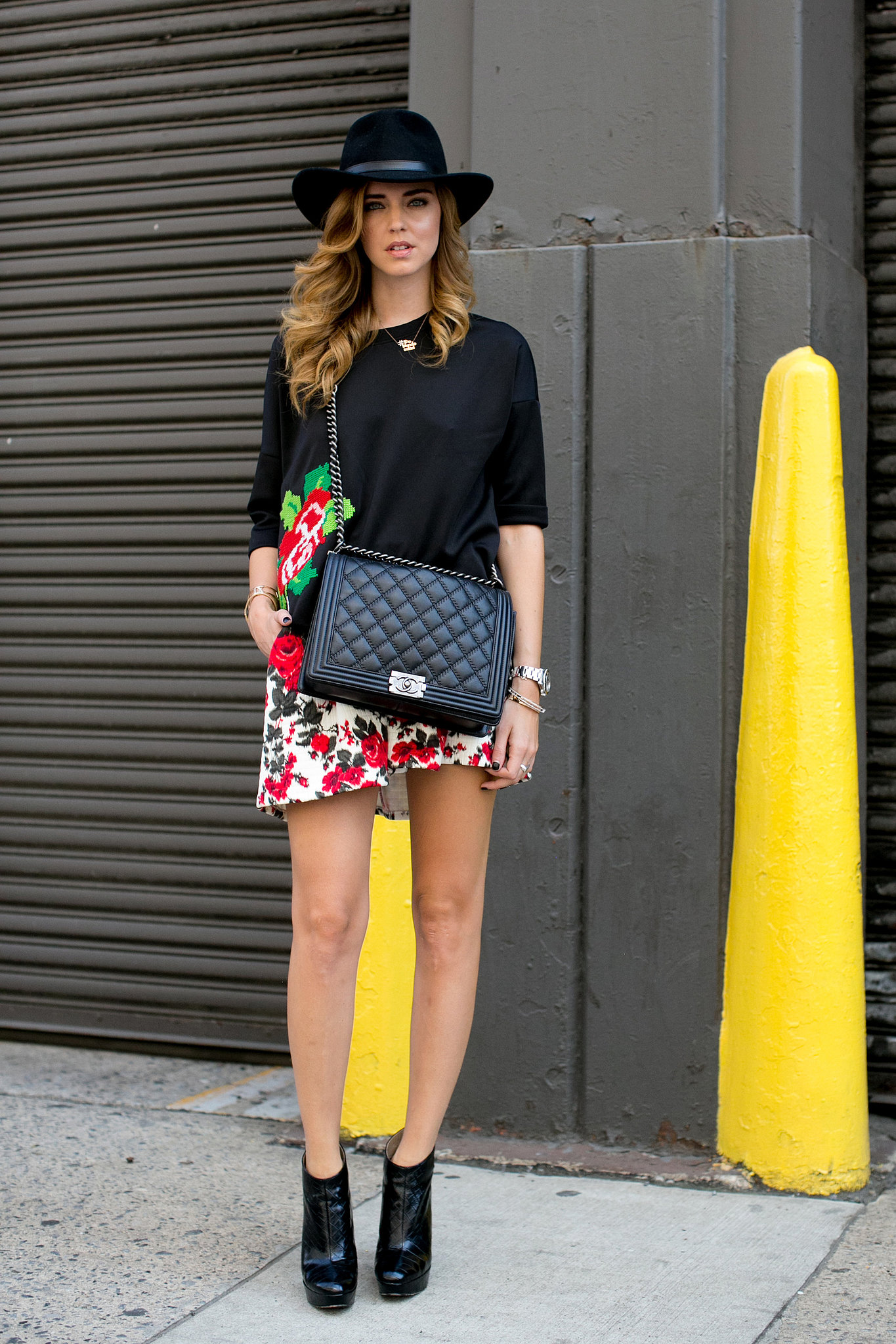 Chiara Ferragni was one part girlie-girl, one part boho in a wide-brim hat and florals.
