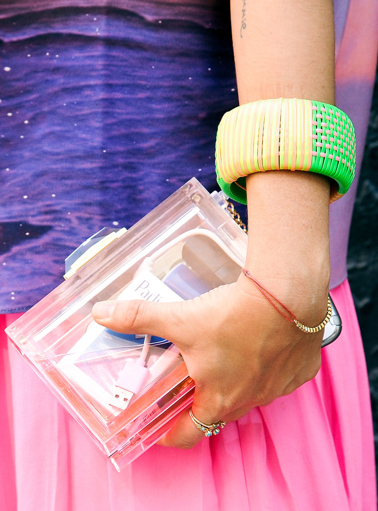 A lucite clutch looked lovely against a splash of color.
A lucite clutch looked lovely against a splash of color.