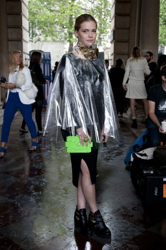 The coolest kind of rainy-day gear, complete with a neon Chanel clutch.
The coolest kind of rainy-day gear, complete with a neon Chanel clutch.