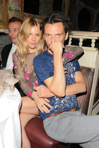 Sienna Miller and Matthew Williamson sat tight at the designer's Fashion Week afterparty.
Sienna Miller and Matthew Williamson sat tight at the designer's Fashion Week afterparty.