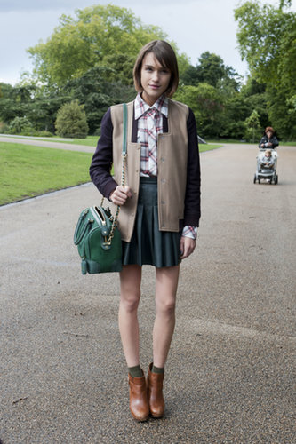 Blogger Ella Catliff borrowed a bit from the boys and outfitted her pleated leather skirt with a button-down and a varsity jacket.
Blogger Ella Catliff borrowed a bit from the boys and outfitted her pleated leather skirt with a button-down and a varsity jacket.