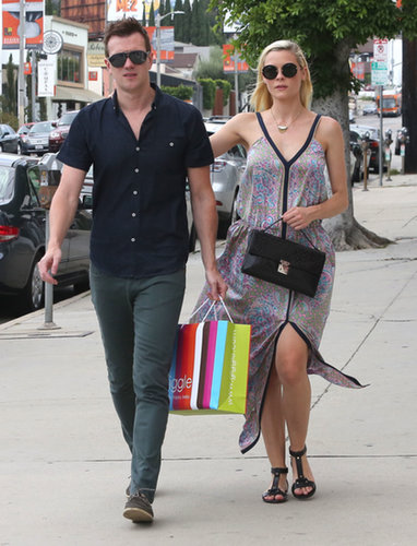 Jaime King donned a printed maxi dress while strolling West Hollywood with her husband. We especially dig the front slit, and all her cool black add-ons.
Jaime King donned a printed maxi dress while strolling West Hollywood with her husband. We especially dig the front slit, and all her cool black add-ons.