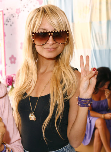 Nicole Richie flashed a peace sign at a Disney Couture party hosted by her longtime friend Kidada Jones in May 2007.
Nicole Richie flashed a peace sign at a Disney Couture party hosted by her longtime friend Kidada Jones in May 2007.