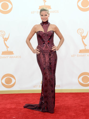 The unique neckline on Heidi Klum's Atelier Versace dress caught our eye first. Her sparkle came courtesy of Lorraine Schwartz gems.
The unique neckline on Heidi Klum's Atelier Versace dress caught our eye first. Her sparkle came courtesy of Lorraine Schwartz gems.