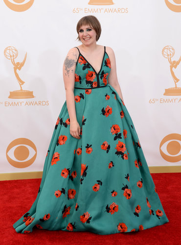 Lena Dunham picked a Prada ball gown with scattered red blooms.
Lena Dunham picked a Prada ball gown with scattered red blooms.
