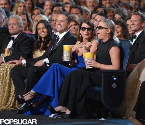 Tina Fey and Amy Poehler ate popcorn during a skit.
Tina Fey and Amy Poehler ate popcorn during a skit.