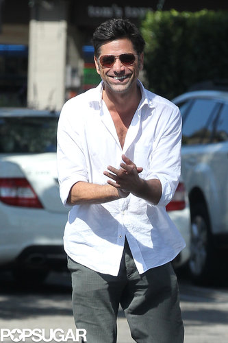 John Stamos smiled for cameras while leaving a restaurant.
John Stamos smiled for cameras while leaving a restaurant.