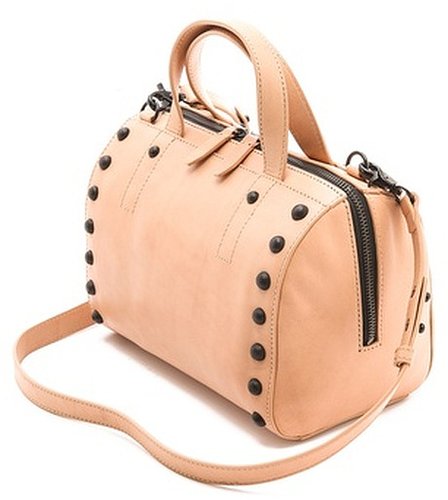 I always love Loeffler Randall's take on what's in style, and this new Small Duffel Bag ($395) gives me that top handle look for Fall with the crossbody strap I love. Plus, the studs make the bag so much more than a simple work bag without being overly fussy. Cute bag that's big enough for me to wear to work every day? Now that's a must have.
— Melissa Liebling-Goldberg, fashion and beauty director
I always love Loeffler Randall's take on what's in style, and this new Small Duffel Bag ($395) gives me that top handle look for Fall with the crossbody strap I love. Plus, the studs make the bag so much more than a simple work bag without being overly fussy. Cute bag that's big enough for me to wear to work every day? Now that's a must have.
— Melissa Liebling-Goldberg, fashion and beauty director